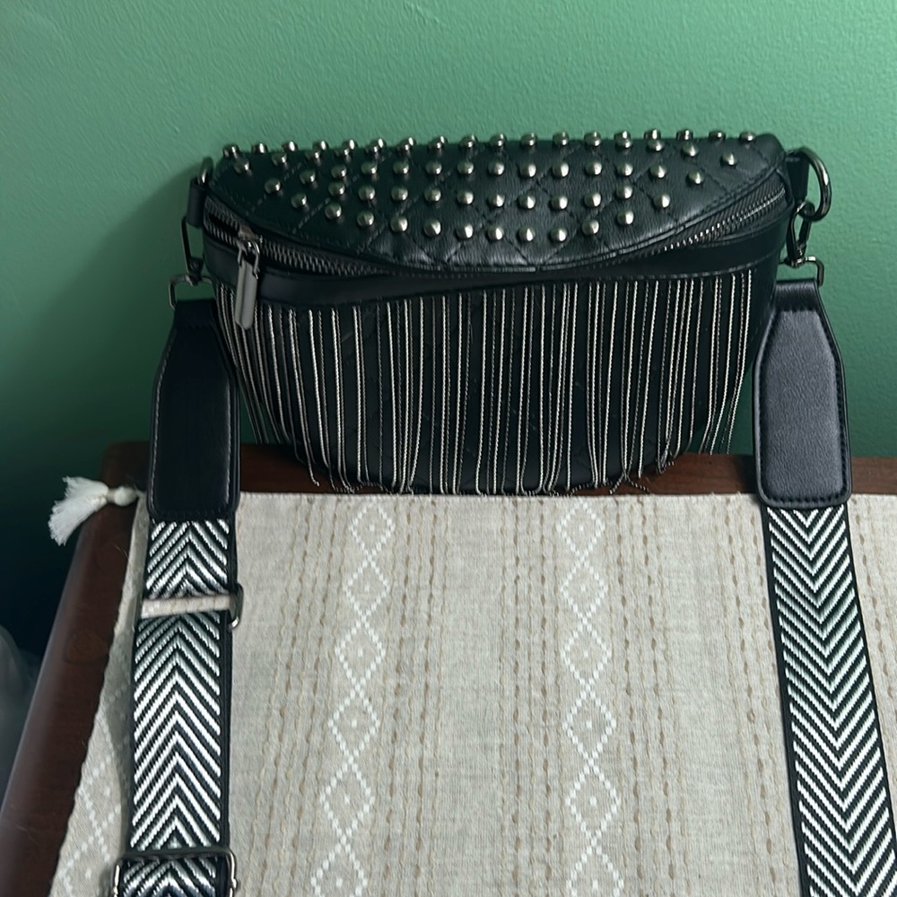 Brand new. Never used. Black crossbody purse